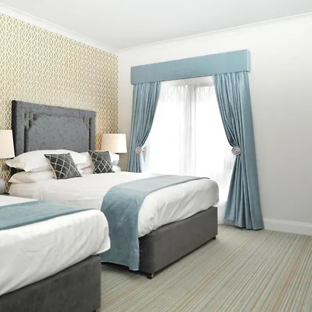 호텔 Treacys Oakwood Hotel,