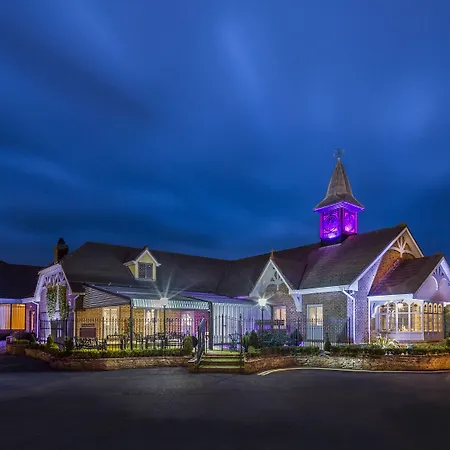 호텔 Treacys Oakwood Hotel,