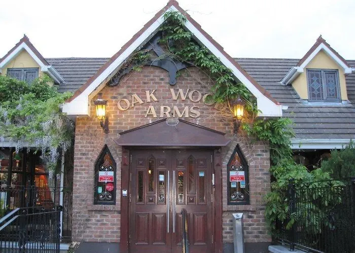 호텔 Treacys Oakwood Hotel,